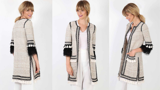 Abrigo de punto en beige y negro de la firma The Extreme Collection