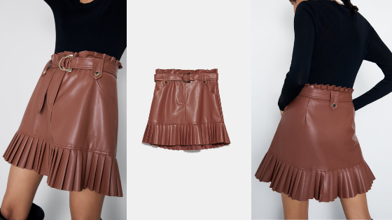 Falda con volante plisado en el bajo de Zara en color rosa