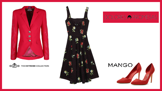 Vestido negro estampado con flores de Dolores Promesas, con levita y zapatos en tonos vivos que combinan con las flores del vestido.