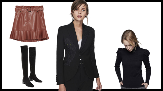 Blazer negra, falda rosa plisada, botas altas negras y jersey de cuello vuelto negro